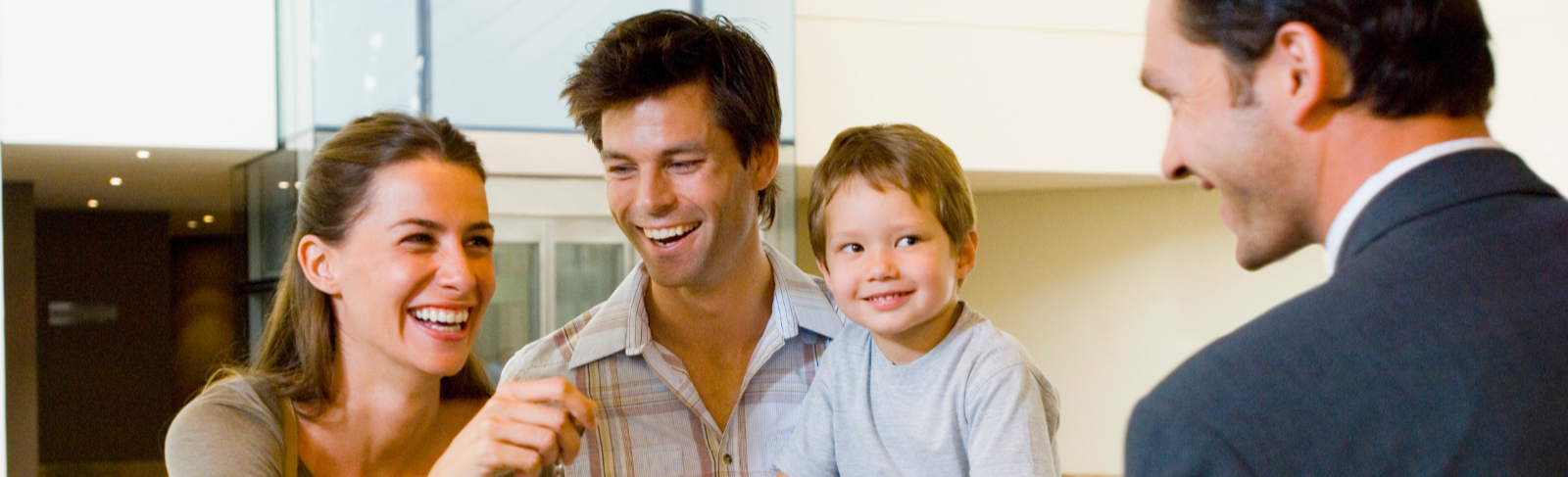 Family checking into a hotel.