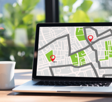 A laptop with a graphic map on the screen.