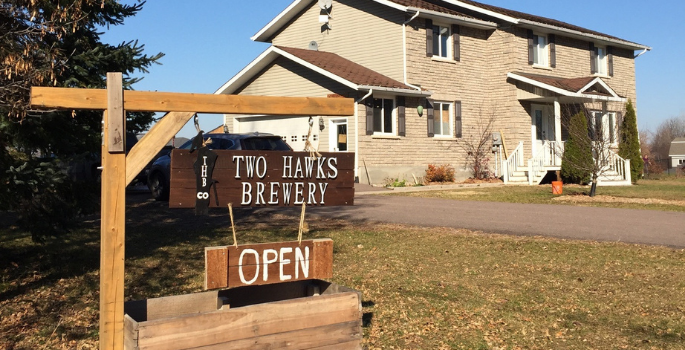 The open sign at Two Hawks Brewing Co.