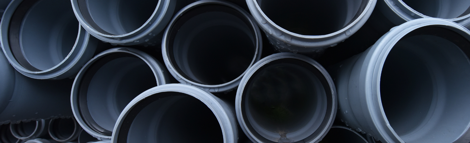 Sewage pipes stacked.