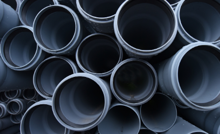 A pile of sewage tubes. 