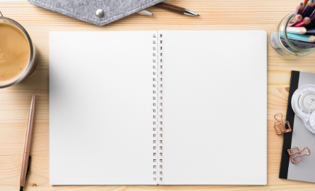 An open notebook on a table.