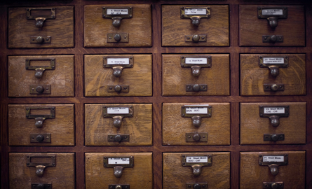 Wood cubbies to store files and information.
