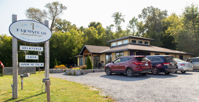 Outside shot of Farmstead Cheesehouse, a local business set in a rural setting.