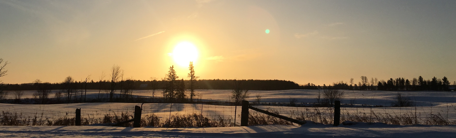 Sunrise on a country road in LV.