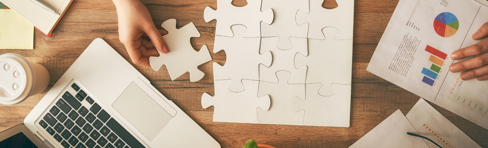 Puzzle pieces laid out on a table.