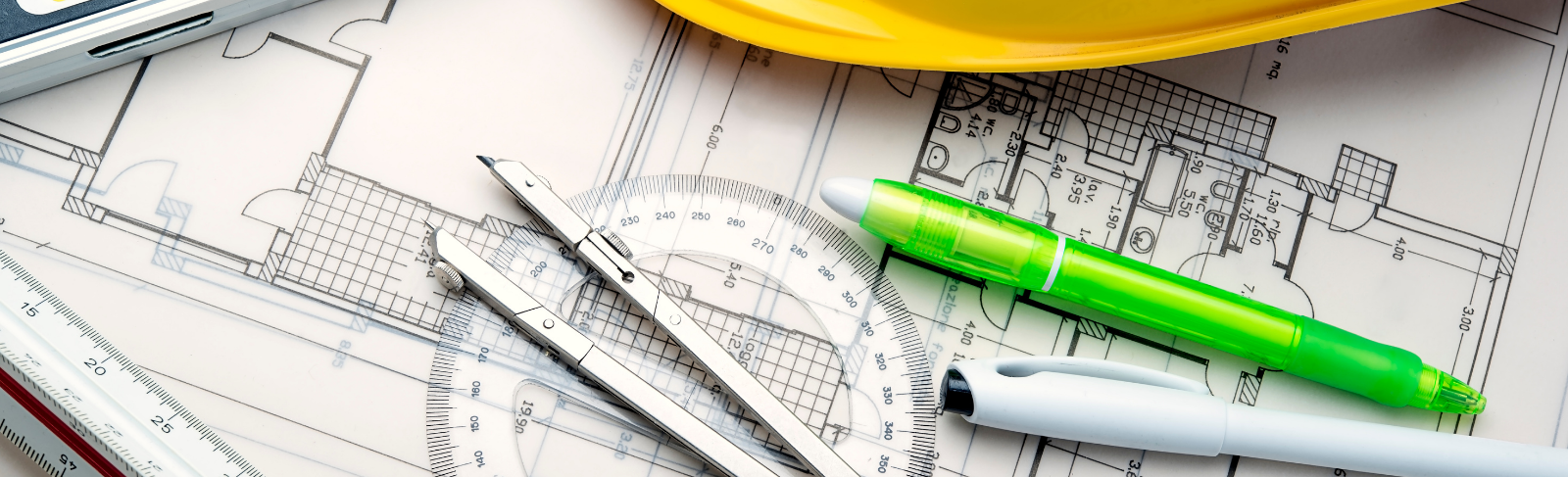 Flat lay of draft paper and materials. 