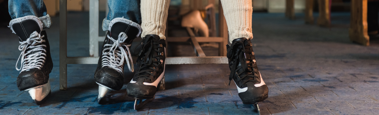 2 pairs of outdoor ice skates.